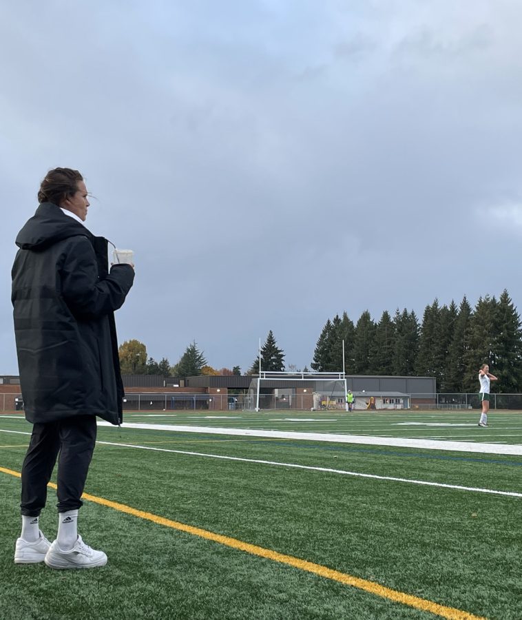 Emily Menges looking out onto the field.