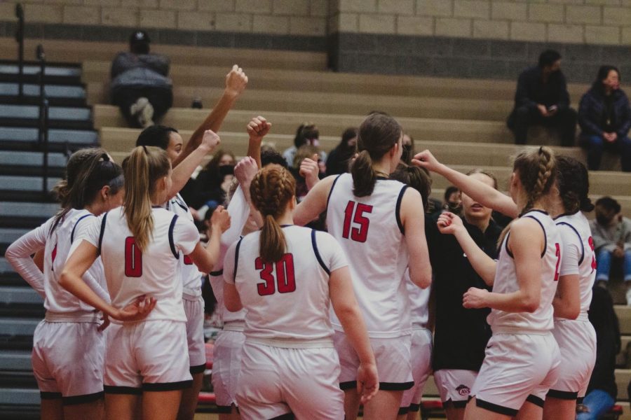 The Clackamas Cavaliers girls basketball team prepare for their game against the David Douglas Scots.