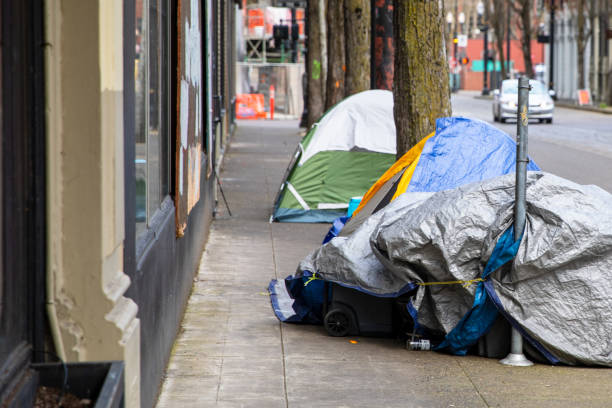 Portland, Oregon USA - March 6, 2021:Homeless Tents Spilling into Portland City Sidewalks.